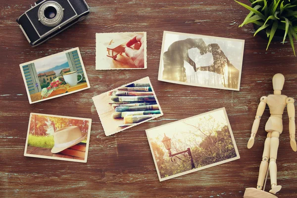 Top view of photos collage on wooden background — Stock Photo, Image