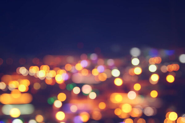 Image of colorful blurred defocused bokeh Lights. motion and nightlife concept.
