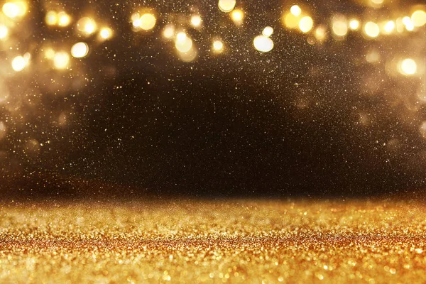 Pırıl pırıl ışıklar arka plan. Altın ve siyah. & Odaklan