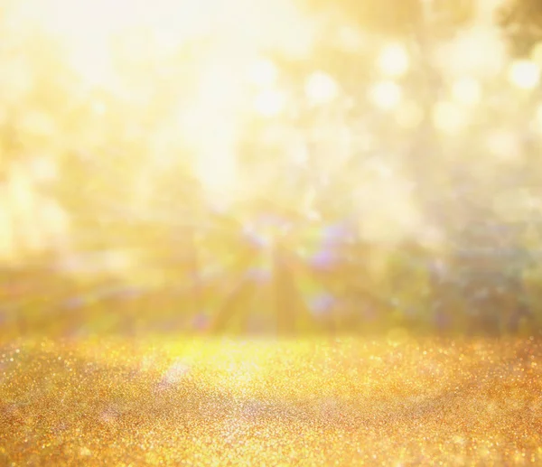 Abstract photo of light burst among trees and glitter bokeh lights. image is blurred and filtered — Stock Photo, Image