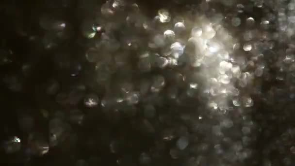 Filmati di riflessi di luci glitter oro, nero e argento . — Video Stock