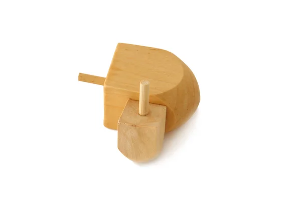 Imagen de vacaciones judías símbolo de Hanukkah: dreidel de madera (peonza) aislado en blanco — Foto de Stock