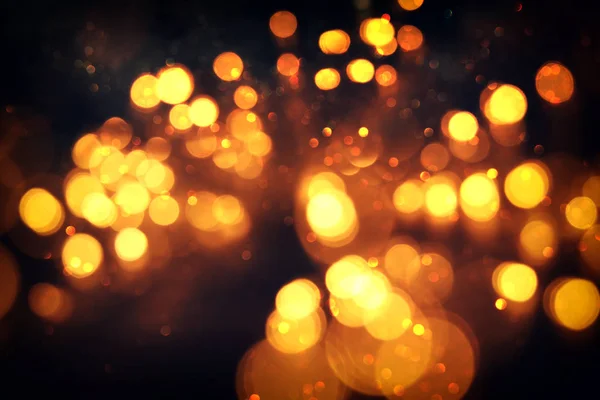 Abstracte bokeh achtergrond van gouden licht burst gemaakt van bokeh beweging — Stockfoto