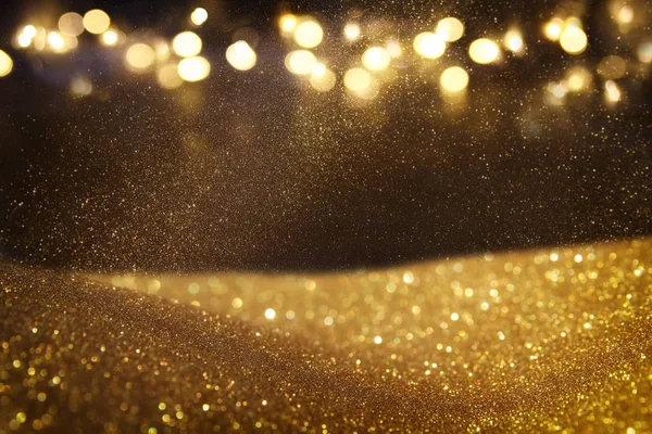 Glitter vintage lights background. dark gold and black. de focused. — Stock Photo, Image