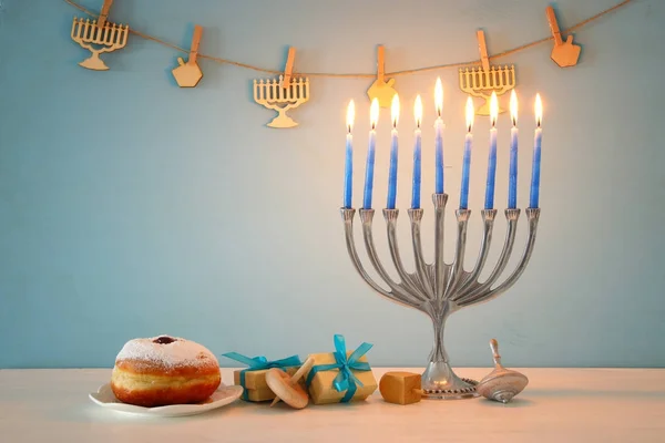 Image of jewish holiday Hanukkah background with traditional spinnig top, menorah (traditional candelabra) — Stock Photo, Image