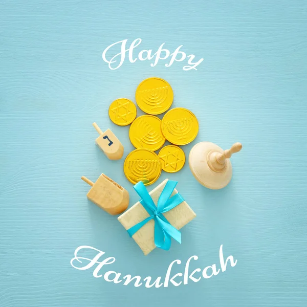 jewish holiday Hanukkah image background with traditional spinnig top and chocolate coins
