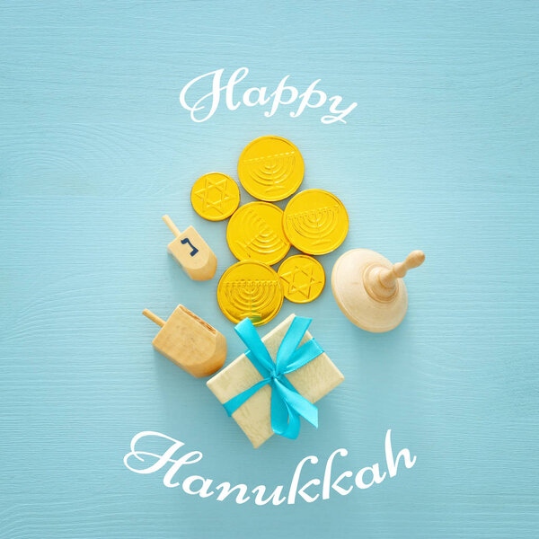 jewish holiday Hanukkah image background with traditional spinnig top and chocolate coins