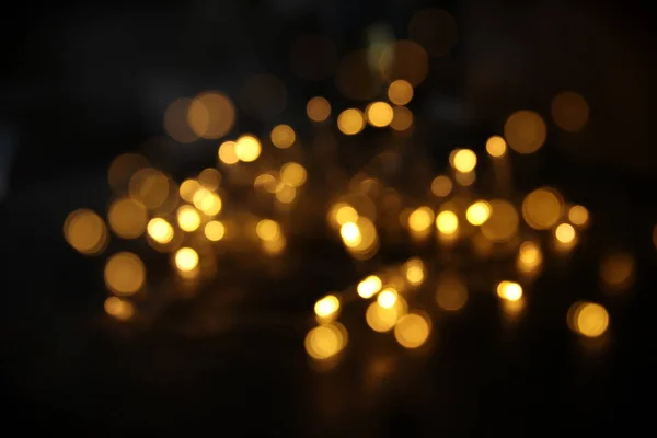 Abstracte bokeh achtergrond van gouden licht burst gemaakt van bokeh beweging — Stockfoto