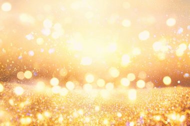 Parıldayan klasik ışıklar arka planında. Koyu altın ve siyah. & Odaklan.