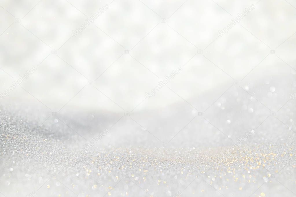 glitter vintage lights background. light blue and silver. de focused