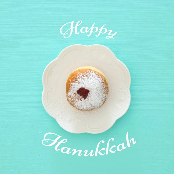 Vacaciones judías Hanukkah imagen de fondo con rosquilla tradicional — Foto de Stock