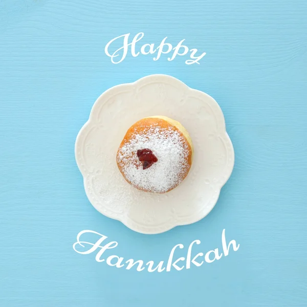 Férias judaicas Hanukkah imagem de fundo com donut tradicional — Fotografia de Stock