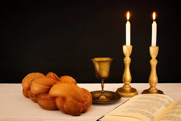 Shabbat image. challah bread, shabbat wine and candles on the table — Stock Photo, Image