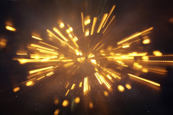 золотые блестки на заднем плане. defocused
