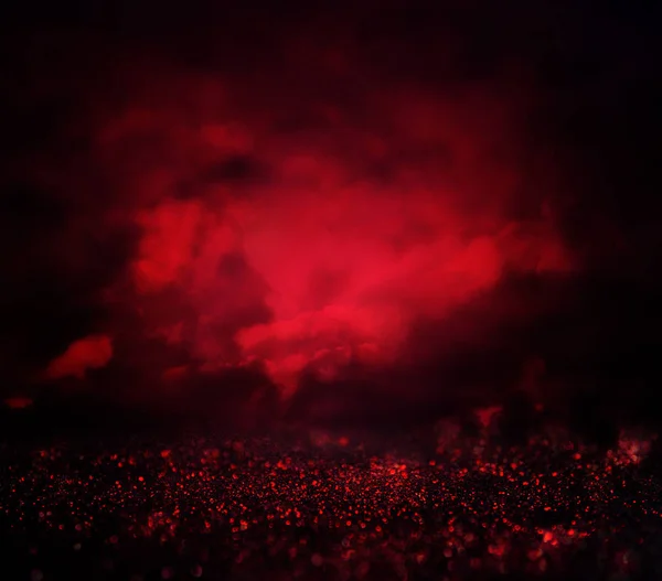 Fekete és piros csillogó háttér világítás. defocused — Stock Fotó