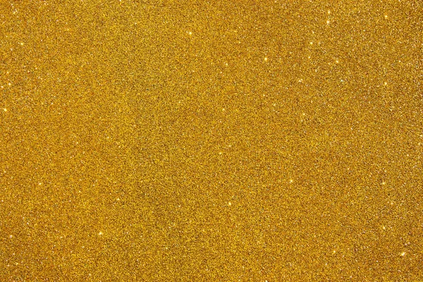 Gold glitter vintage lights background. de focused. — Stock Photo, Image