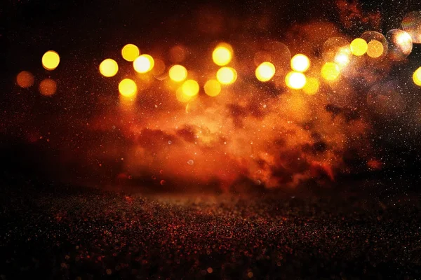 赤と黒と金の輝きのヴィンテージライトの背景。集中力を失い — ストック写真