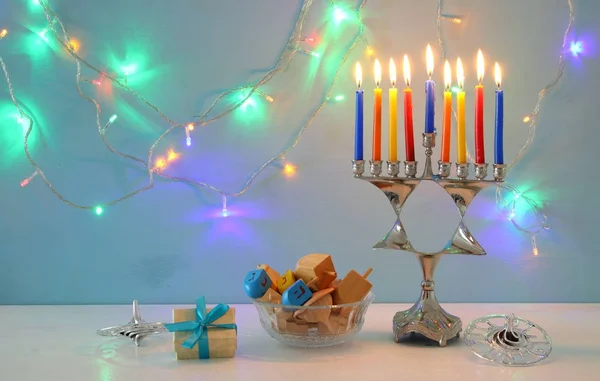 image of jewish holiday Hanukkah background with menorah (traditional candelabra).