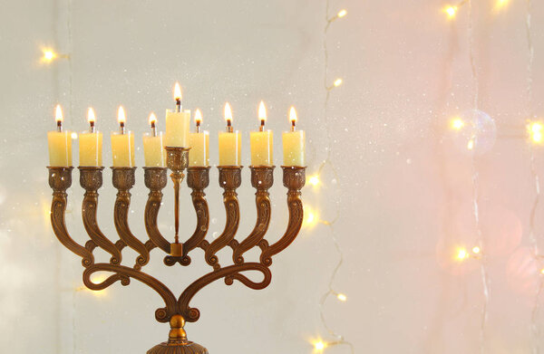 image of jewish holiday Hanukkah background with menorah (traditional candelabra)