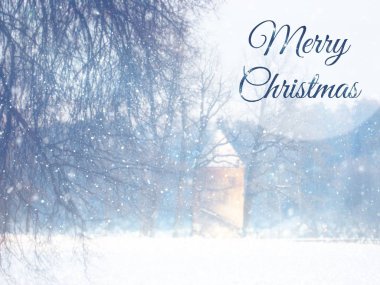 Metin tebrik ile bulanık ve soyut sihirli kış manzara fotoğraf: neşeli Noel. Glitter yerleşimi.