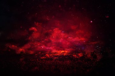 siyah ve kırmızı ışıklar arka plan parıltı. defocused.