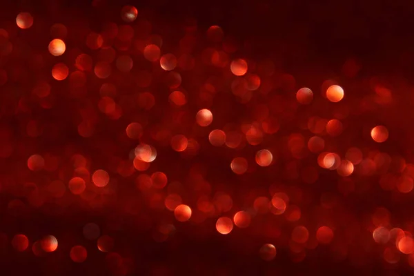 Black and red glitter lights background. defocused. — Stock Photo, Image