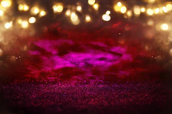 Lila, piros, rózsaszín, arany és fekete csillogó fények háttér. defocused. — Stock Fotó