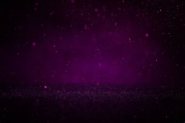 Purple and black glitter lights background. defocused. — Stock Photo, Image