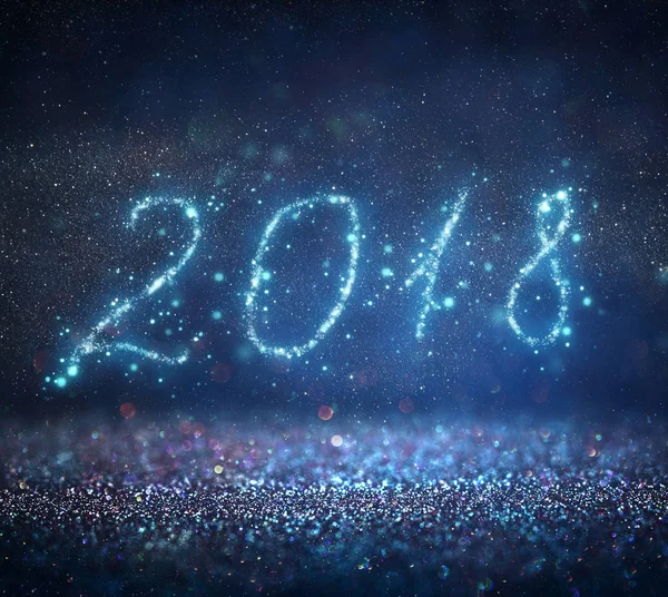Mutlu yeni yıl 2018 glitter ile arka plan ışıklar. de-odaklı.