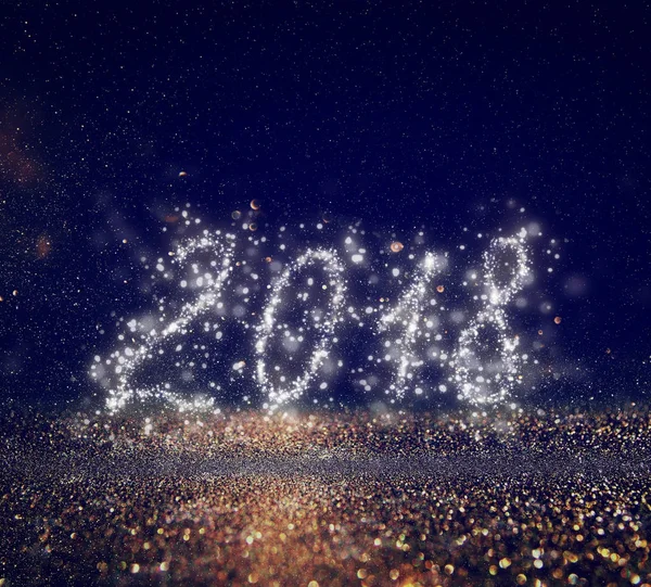 Šťastný nový let 2018 s glitrem světla pozadí. de-zaměřil. — Stock fotografie