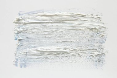 Beyaz arka plan üzerine suluboya fırça darbesi.