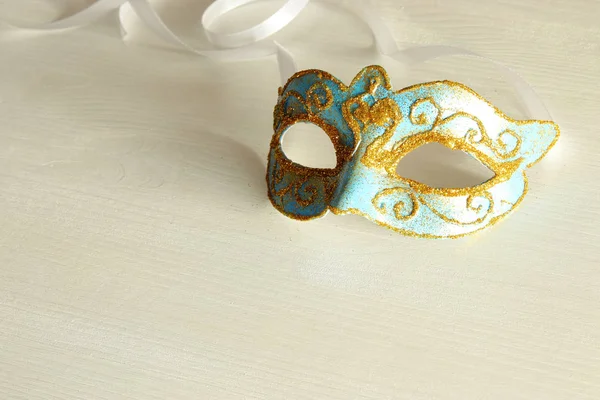 Image of delicate blue elegant venetian mask white background. — Stock Photo, Image