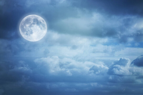 A soft cloud background with a blue pastel colors, moon and dreamy concept.