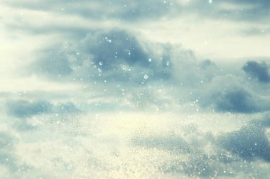 Gümüş ve Altın ışık arka plan parıltı. defocused.