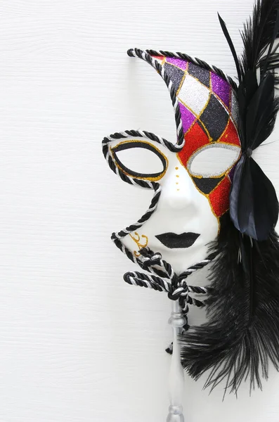 Top view image of dramatic masquerade venetian mask over white background. Flat lay. — Stock Photo, Image