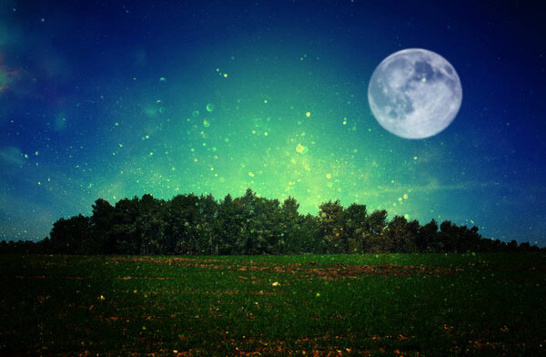 Surreal fantasy concept - full moon with stars glitter in night skies background