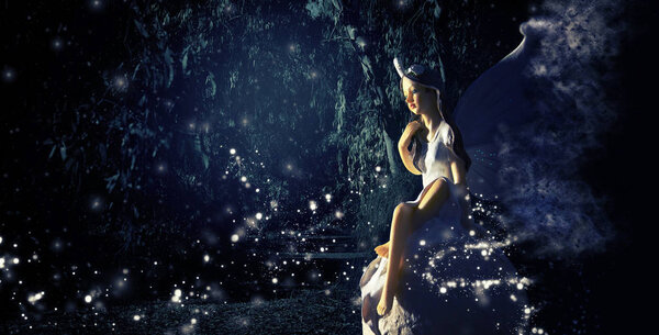Image of magical little fairy in the forest sitting over the stone