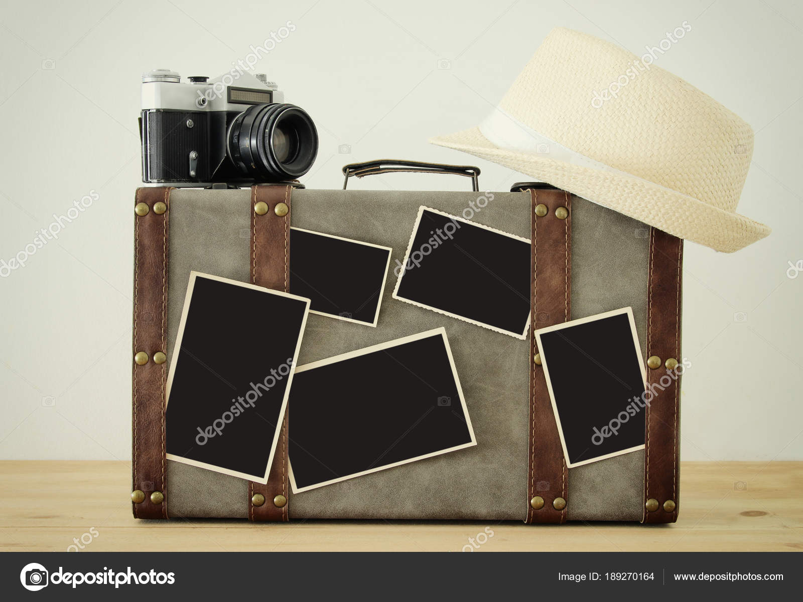 Download Image Of Old Vintage Luggage Fedora Hat Vintage Old Photo Camera And Blank Photos For Photography Montage Mockup Over Wooden Floor Stock Photo C Tomert 189270164 PSD Mockup Templates