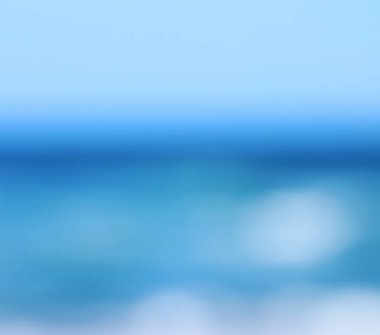 arka plan bulanık plaj ve deniz dalgalarının bokeh güneş ışığı ile.