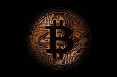 Koyu arka plan üzerinde altın Bitcoin. İş ve sanal cryptocurrency kavramı.