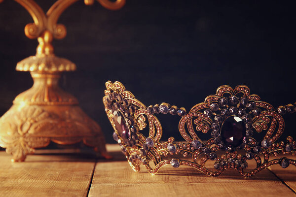 low key image of beautiful queen/king crown. fantasy medieval period. Selective focus.