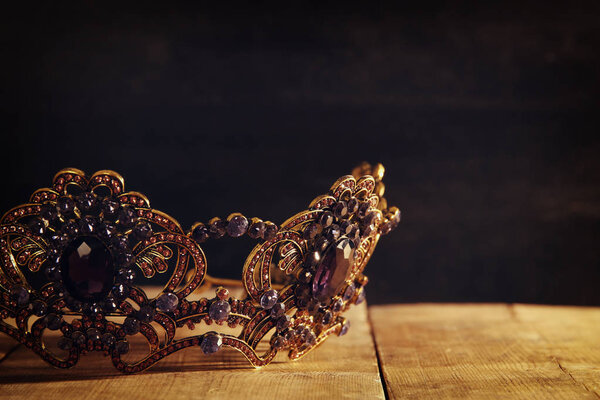 low key image of beautiful queen/king crown. fantasy medieval period. Selective focus.