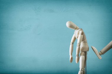 şiddet cincept. üzgün ahşap kukla.