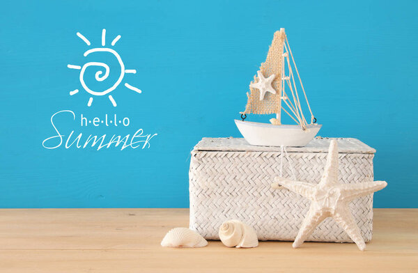 nautical, vacation and travel image with sea life style objects over wooden table.