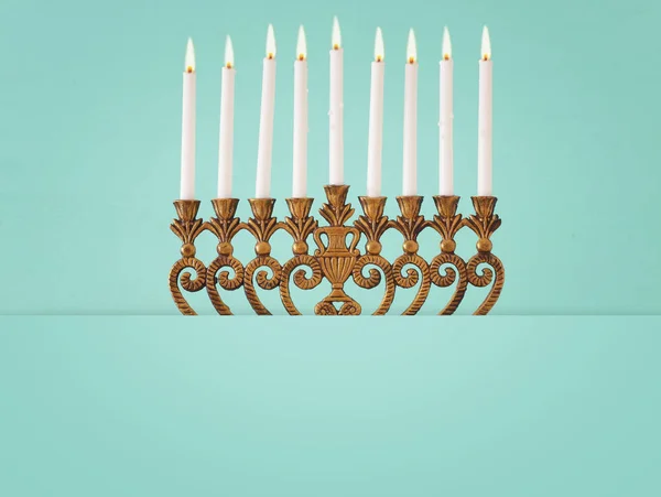 Religion image of jewish holiday Hanukkah background with menorah (traditional candelabra) and candles — Stock Photo, Image