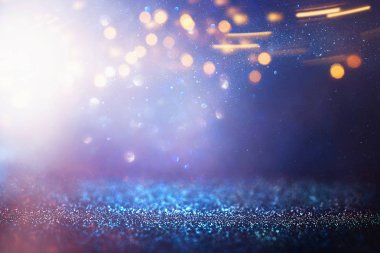 Soyut simli mor, mavi ve altın renkli arka plan. Odaklanmamış