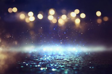 Soyut simli siyah ve mavi ışıklar arka planda. Odaklanmamış