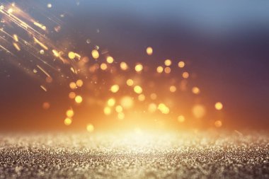 soyut glitter ışıkları arka plan. altın ve siyah. de odaklı