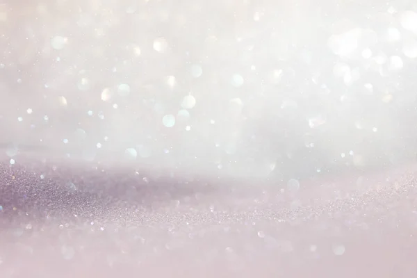 Abstract background of glitter vintage lights . silver, gold and white. de-focused — Stock Photo, Image