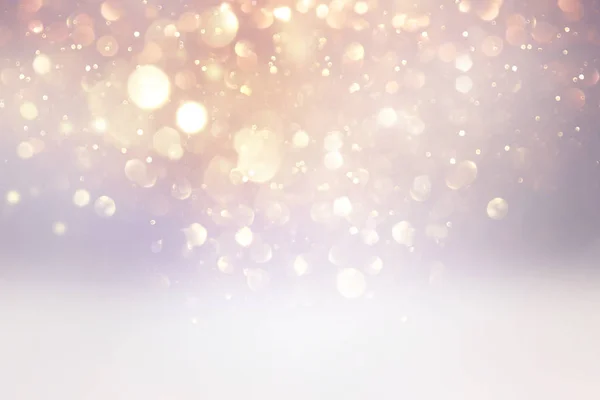 Abstract background of glitter vintage lights . silver, gold and white. de-focused — Stock Photo, Image